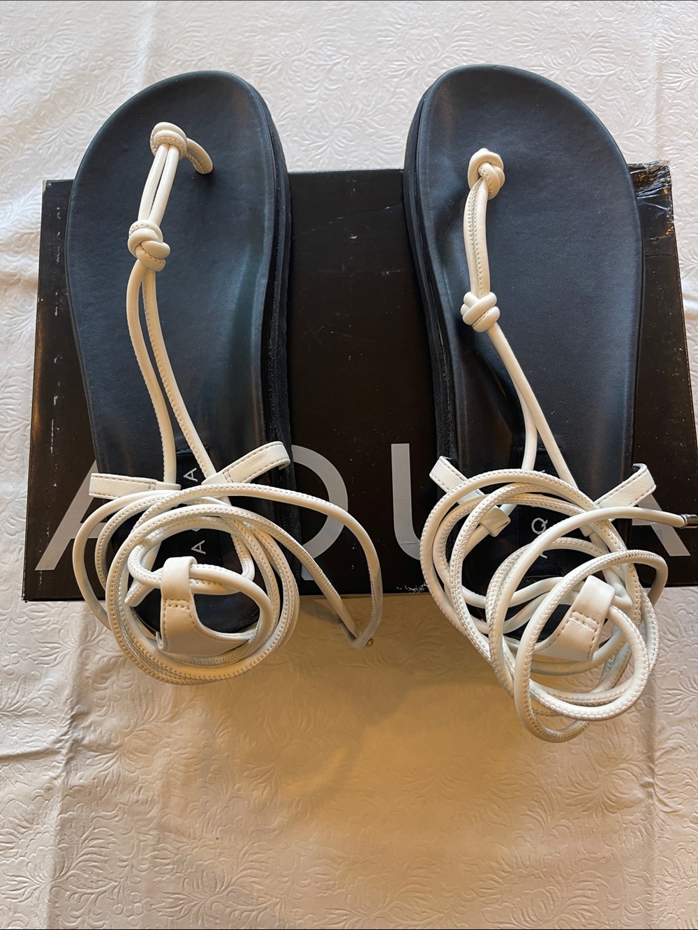 Aqua black and white tie sandals.  Good condition. Only worn a few times.